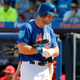 Tim Tebow is a lot more like Chicago Bears legend George Halas than you might think.